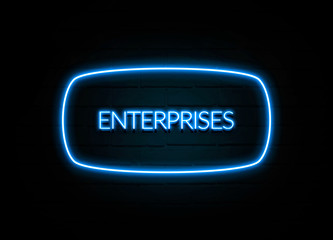 Enterprises  - colorful Neon Sign on brickwall
