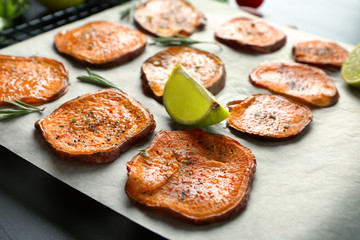 Cooked sweet potato on parchment paper, closeup