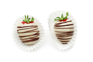 Tasty chocolate dipped strawberries on white  background