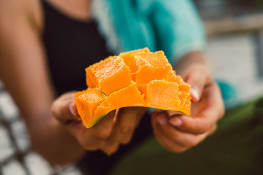 Eating a mango