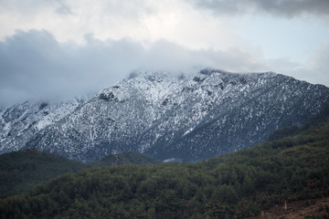 Obraz na płótnie Canvas Snow capped mountain peak