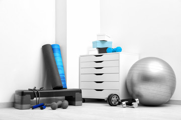 Different physiotherapy equipment in room
