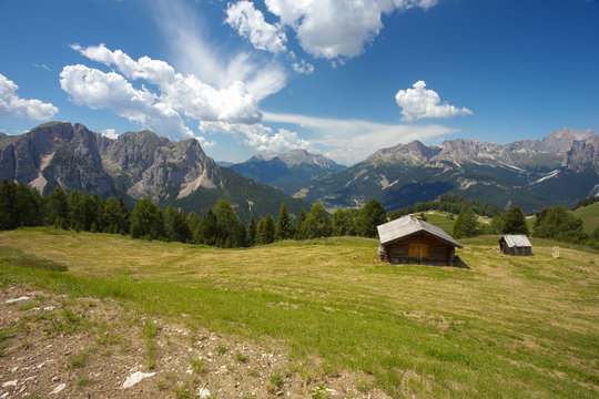 Woody cabin with Dolomites, Italy