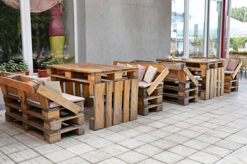 Outdoor cafe with furniture made of secondary raw materials