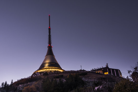 The "Ještěd" tower. Czech landmark lights under clear blue sky.