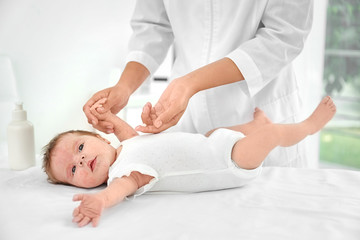 Obraz na płótnie Canvas Adorable baby with skin allergy undergoing treatment in hospital