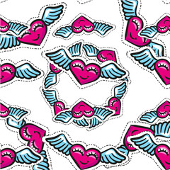 Seamless vector pattern with winged hearts. Hand drawn. Valentine day