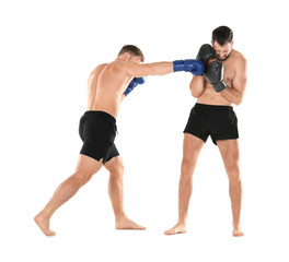 Fototapeta na wymiar Male boxers fighting on white background
