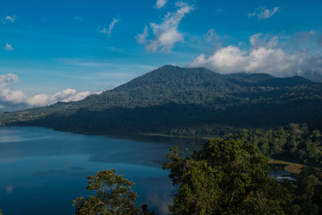 Beatiful view over the lake. Lake and mountain view from a hill, Buyan Lake, Bali.