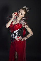 Naklejka premium Haloween look. The cartoon character with an red apple.