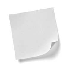 close up of  a note paper with a red push pin on white background