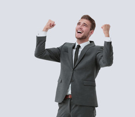 Lucky handsome businessman celebrating. Winner  laughing man