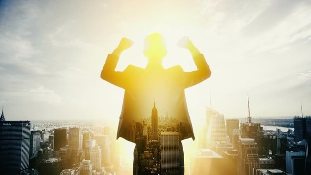 Businessman happy and looking cityscape. Double exposure.