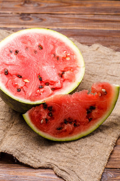 Image of cut watermelon on cloth