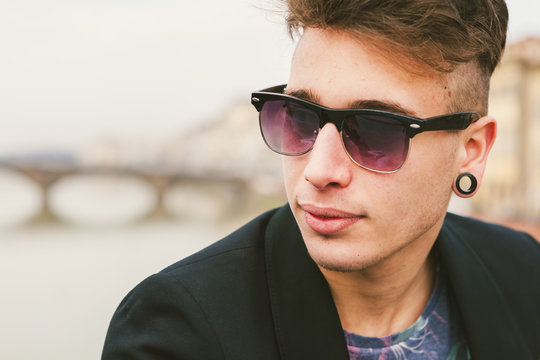 Portrait of a Stylish Teenage Male with Sunglasses