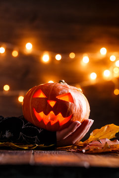 Picture of halloween background with pumpkin and witch hand