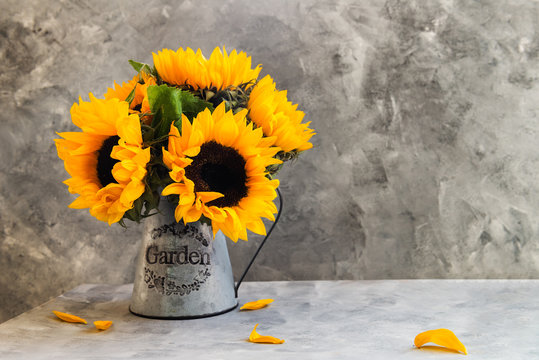 Yellow Sunflower Bouquet In Garden Jar