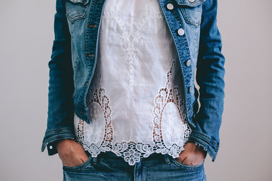 Cropped woman wearing denim and lace
