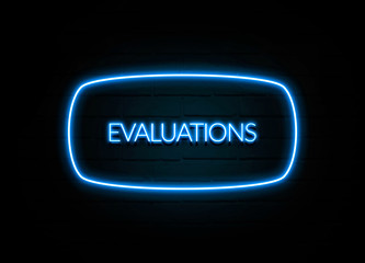 Evaluations  - colorful Neon Sign on brickwall
