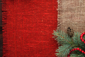 christmas decorated red burlap tablecloth background top view - 177204604