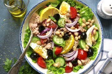 Tuna salad with vegetables and white bean.Top view.