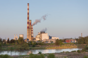 Fototapeta na wymiar heat and power plant smog river chimneys 09