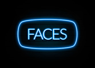 Faces  - colorful Neon Sign on brickwall
