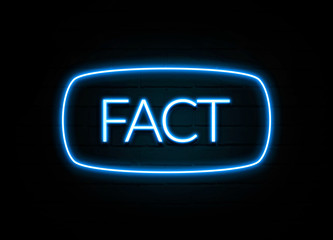 Fact  - colorful Neon Sign on brickwall