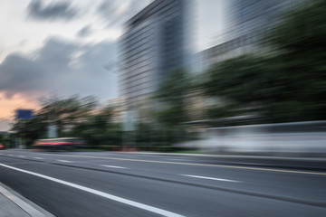 Fototapeta na wymiar China Shanghai modern architecture, motion blur car..
