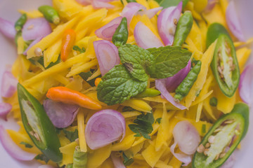 Sambal Mangga or Fresh Mango Salad, Soft Focus or Blur Effect Background 