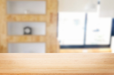 Empty of wood table top on blur of window glass in the morning background. for your photomontage or product display.