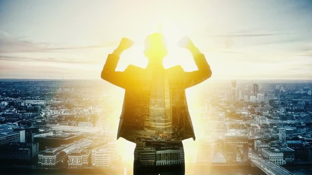 Businessman happy and looking cityscape. Double exposure.