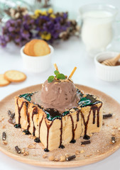 Toast topping with chocolate sauce and ice cream.