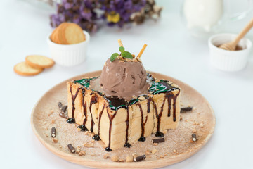 Toast topping with chocolate sauce and ice cream.
