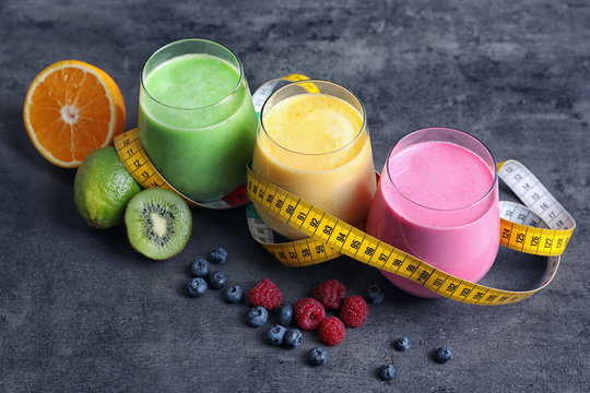 Glasses With Different Protein Shakes On Table