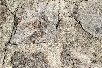Tan rock wall with mortar