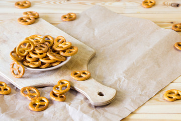Pretzels on the wooden board, copy space