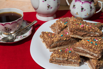 Cakes with a colorful sprinkling of stars on a white plate