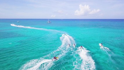 aerial footage of turquoise waters on the tropical paradise of the cayman islands in the caribbean