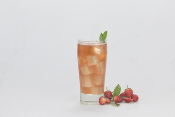 Sweet strawberry juice with white backdrop.