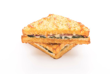 baked spinach and ham sandwich with sauce