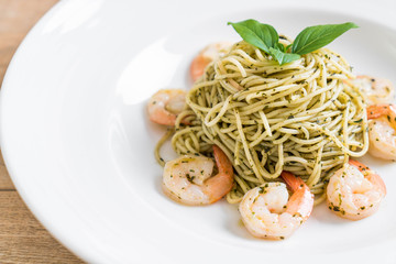 pasta spaghetti with pesto green and shrimps