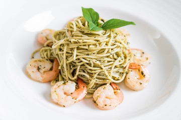 pasta spaghetti with pesto green and shrimps