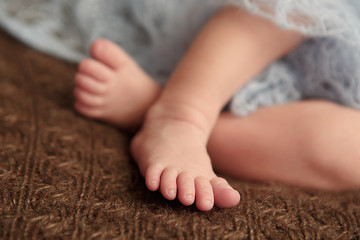 Newborn baby tender sleeping on wool couturier blanket. Pure human value love faith humanity care