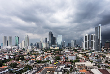 Tropical storm coming over Jakarta business district in Indonesia.