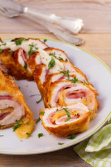 Chicken breasts with cheese and bacon. Crispy, creamy chicken wraps, horizontal