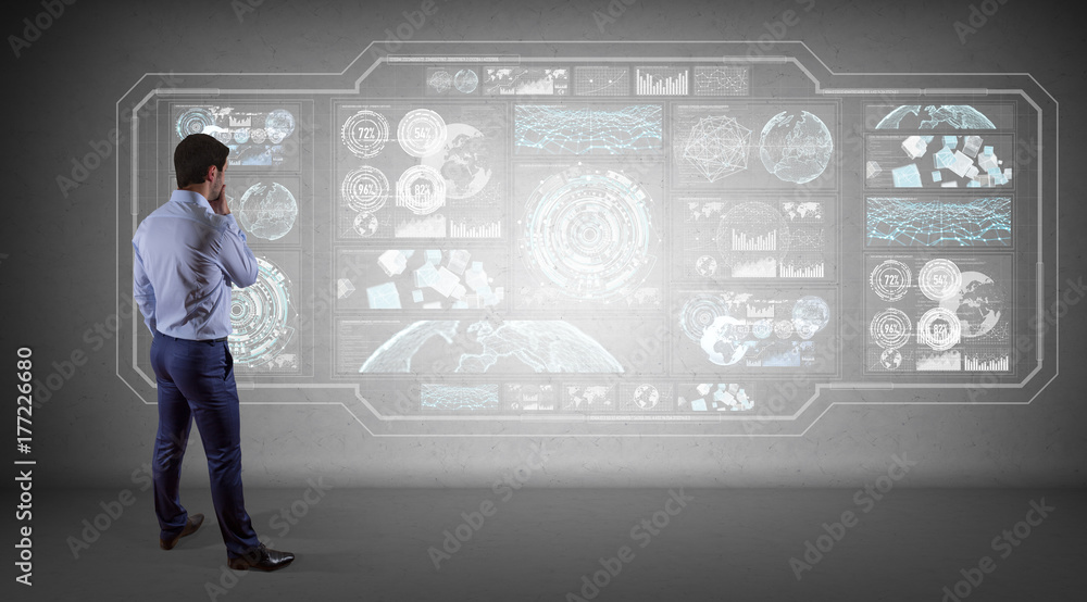 Poster Businessman using graph screens interface on a wall 3D rendering