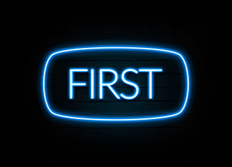 First  - colorful Neon Sign on brickwall