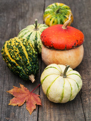 Pumpkins with autumn leaves