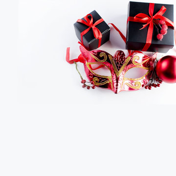 Black christmas  gift  box with red ribbon and nask